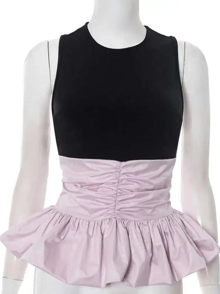 Poppi Peplum Top